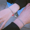 Pärchenarmband mit magnetischer Herzkette (2 Stück)